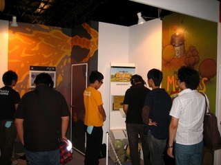 Illustration for article titled Booth Check: Q-Games, Nyko, Acquire, Jun-Tech Zodiac Darts